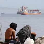 Migrantes en la Playa El Trampolín Migrantes en la Playa El Trampolín