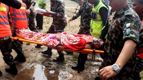 Rescuers transfer a worker rescued alive in Rasuwa district, Nepal, Sept. 4, 2026. Rescuers transfer a worker rescued alive in Rasuwa district, Nepal, Sept. 4, 2026.