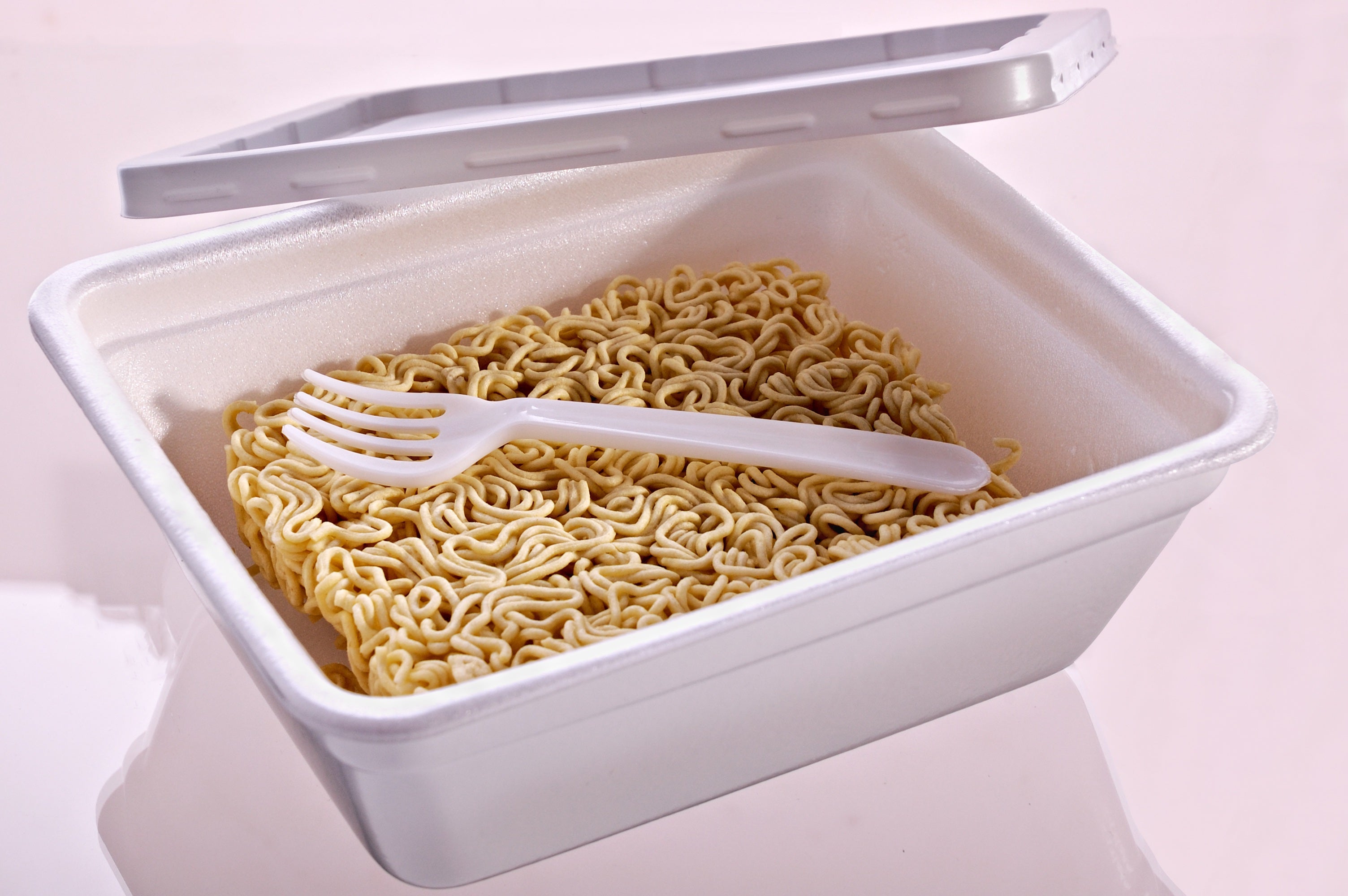Imagen de archivo de un táper con comida. Imagen de archivo de un táper con comida.