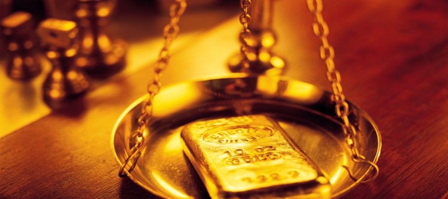Una balanza para pesar oro Una balanza para pesar oro