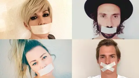 Artistas con la boca tapada en señal de protesta Artistas con la boca tapada en señal de protesta