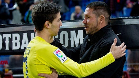 Luciano Vietto junto a Simeone