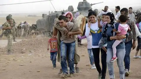 Refugiados sirios de la ciudad de Kobane Refugiados sirios de la ciudad de Kobane