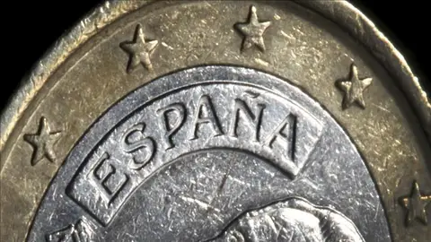 Una moneda de un euro Una moneda de un euro