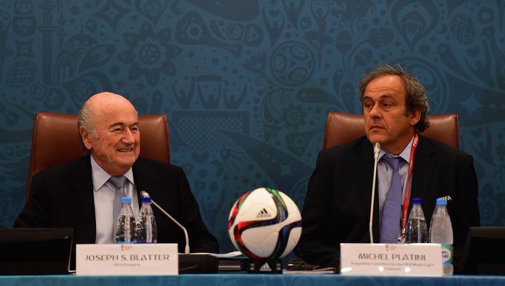 Platini y Blatter durante un seminario