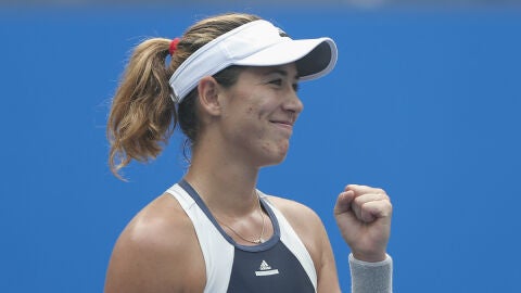 Garbi&ntilde;e Muguruza celebra su triunfo sobre Falconi