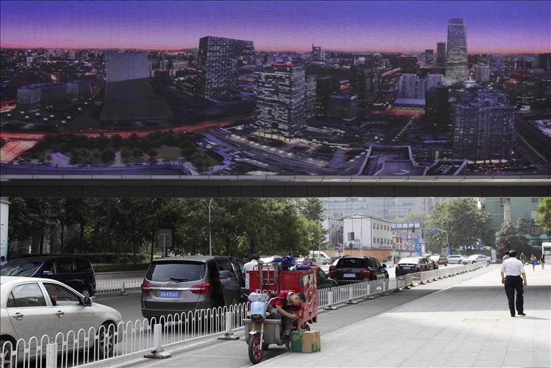 El PIB de China aumentó un 6,9 % en 2015, la menor cifra en 25 años El PIB de China aumentó un 6,9 % en 2015, la menor cifra en 25 años