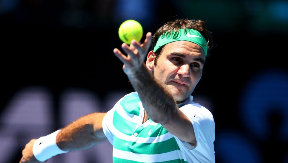 Federer ejecuta un saque ante Dolgopolov