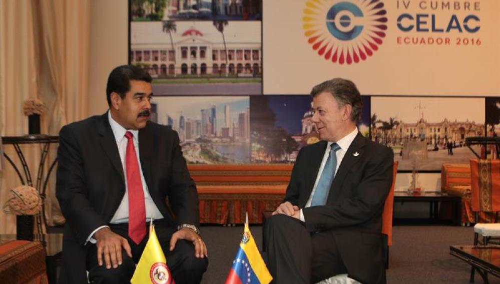 Juan Manuel Santos y Nicolás Maduro. 