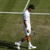 Djokovic, cabizbajo en Wimbledon Djokovic, cabizbajo en Wimbledon