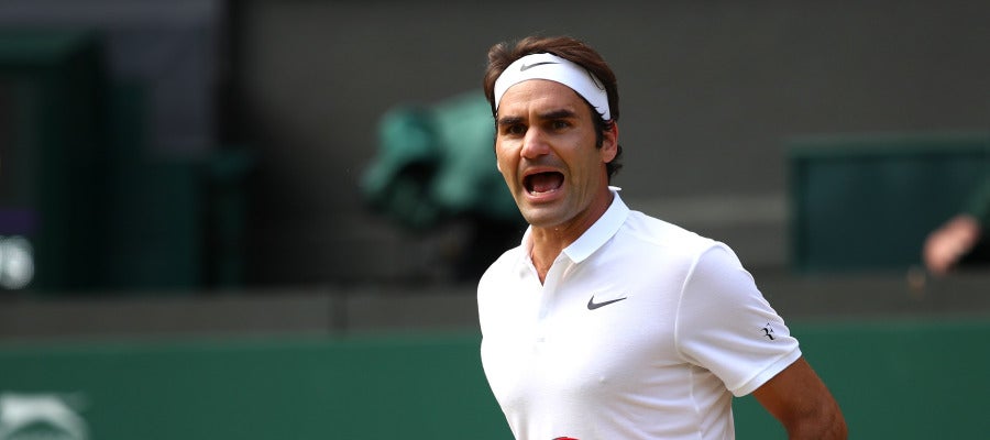 Roger Federer celebra el triunfo en Wimbledon Roger Federer celebra el triunfo en Wimbledon