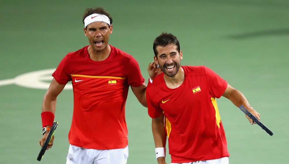 Rafa Nadal y Marc López celebran la victoria