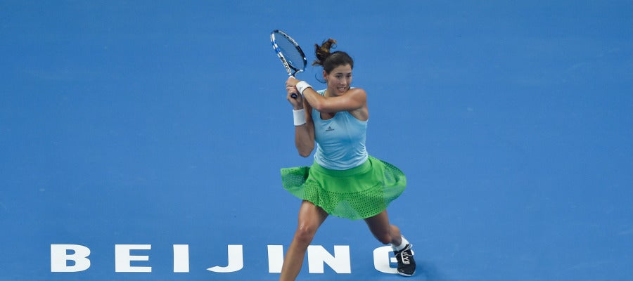 Garbiñe Muguruza, en el partido contra Begu en el Open de China Garbiñe Muguruza, en el partido contra Begu en el Open de China