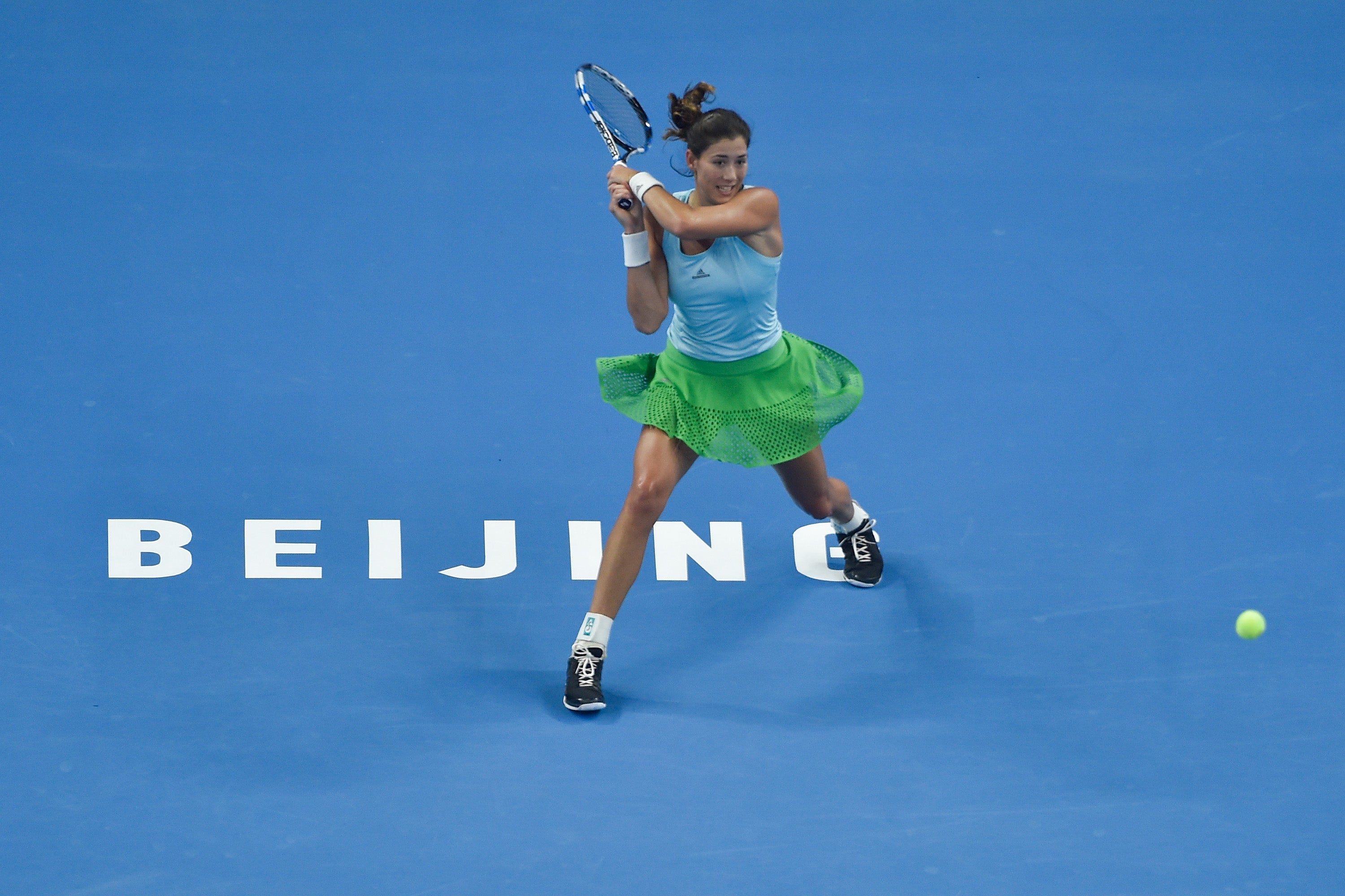 Muguruza inicia con una victoria ante Begu la defensa del Open de China Muguruza inicia con una victoria ante Begu la defensa del Open de China