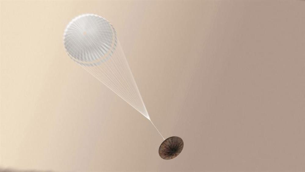 Imagen facilitada por la Agencia Espacial Europea (ESA) muestra una ilustración de un artista del módulo Schiaparelli durante su aterrizaje en Marte