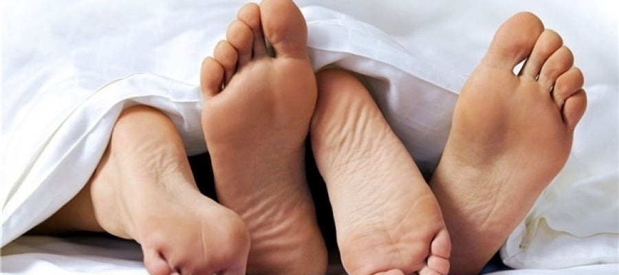Una pareja en la cama Una pareja en la cama