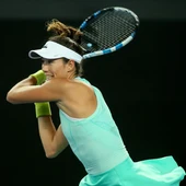 Garbiñe Muguruza golpea de revés una bola Garbiñe Muguruza golpea de revés una bola