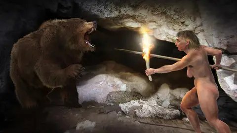 Recreación artística de una mujer neandertal y un oso. / José Antonio Peñas-Sinc. Recreación artística de una mujer neandertal y un oso. / José Antonio Peñas-Sinc.