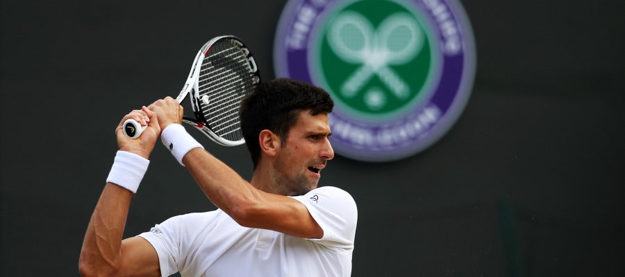Novak Djokovic disputando un partido Novak Djokovic disputando un partido