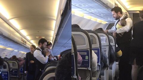 El miembro de la tripulaci&oacute;n con dos beb&eacute;s en brazos