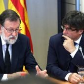 Mariano Rajoy y Carles Puigdemont, en su reunión tras los atentados de Catalunya