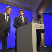 El expresidente catalán, Puigdemont, junto al exconseller de Interior, Forn