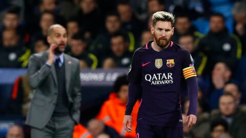 Leo Messi, con Guardiola en segundo plano