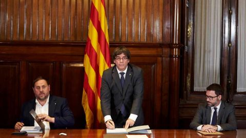 Carles Puigdemont y Oriol Junqueras