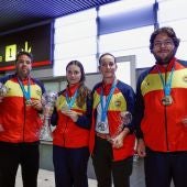 Los cuatro componentes de la selección española de tiro en el aeropuerto de Barajas