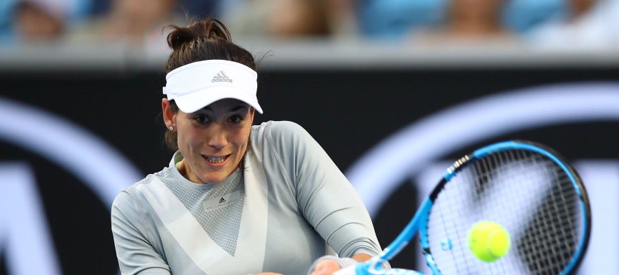 Muguruza golpea de revés durante su partido ante Ponchet Muguruza golpea de revés durante su partido ante Ponchet