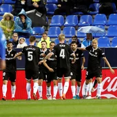 Los jugadores del Sevilla celebran el gol de Correa Los jugadores del Sevilla celebran el gol de Correa