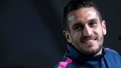 Koke, sonriente Koke, sonriente