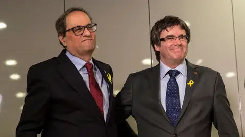 Carles Puigdemont y su sucesor, el recién elegido presidente de la Generalitat de Cataluña Quim Torra Carles Puigdemont y su sucesor, el recién elegido presidente de la Generalitat de Cataluña Quim Torra
