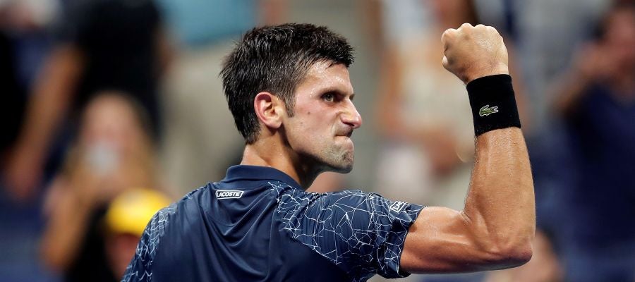 Djokovic celebra un punto contra Millman Djokovic celebra un punto contra Millman
