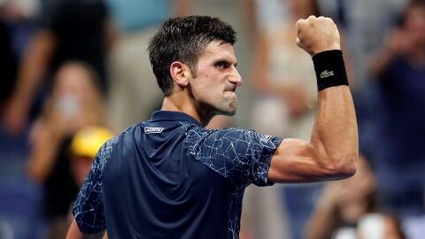 Djokovic celebra un punto contra Millman