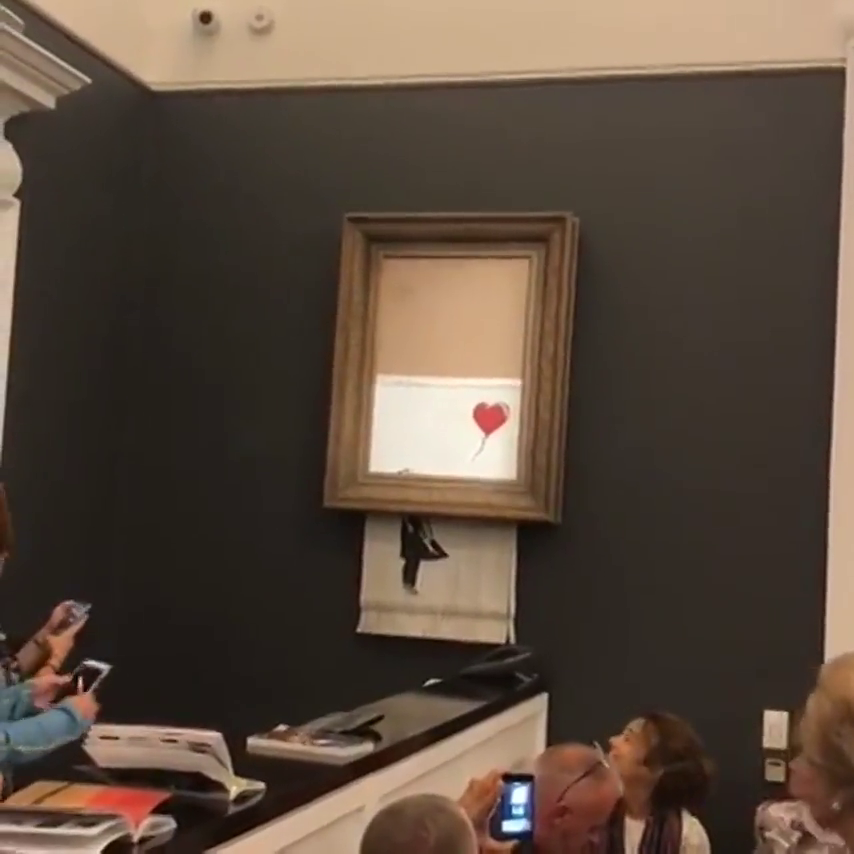 Una obra de Banksy se autodestruye tras subastarse por más de un millón de euros Una obra de Banksy se autodestruye tras subastarse por más de un millón de euros