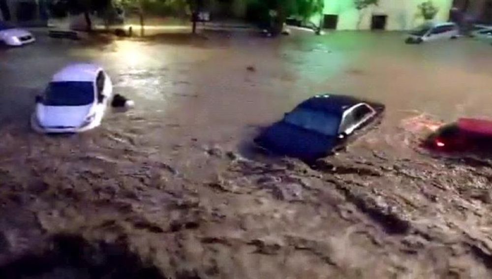 Vista de una calle de la localidad de Sant Llorenç des Cardassar (Mallorca), durante las inundaciones y el desbordamiento de torrentes