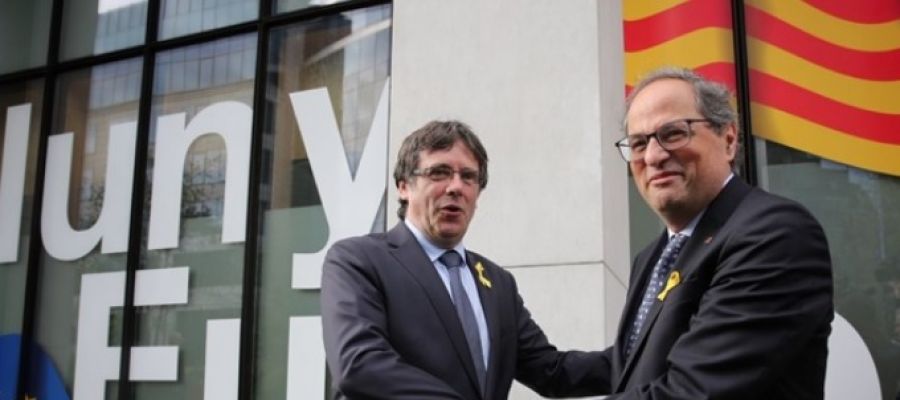 Carles Puigdemont y Quim Torra en una imagen de archivo Carles Puigdemont y Quim Torra en una imagen de archivo