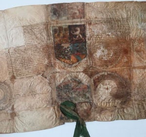 Documento en el que los Reyes Católicos entregan el escudo de armas a Cristóbal Colón Documento en el que los Reyes Católicos entregan el escudo de armas a Cristóbal Colón