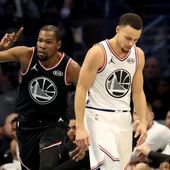Kevin Durant celebra una canasta ante su compañero Stephen Curry Kevin Durant celebra una canasta ante su compañero Stephen Curry