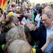 Quim Torra da la mano a los protestantes en la manifestación convocada en Madrid