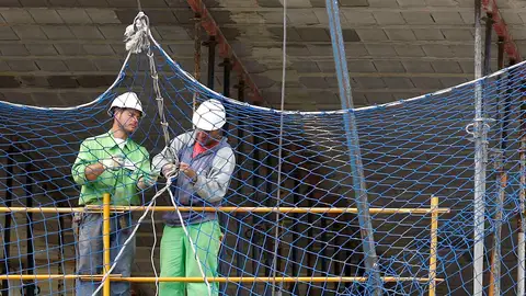 Trabajadores en una obra Trabajadores en una obra