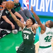 Antetokounmpo intenta anotar ante la defensa de Al Horford Antetokounmpo intenta anotar ante la defensa de Al Horford