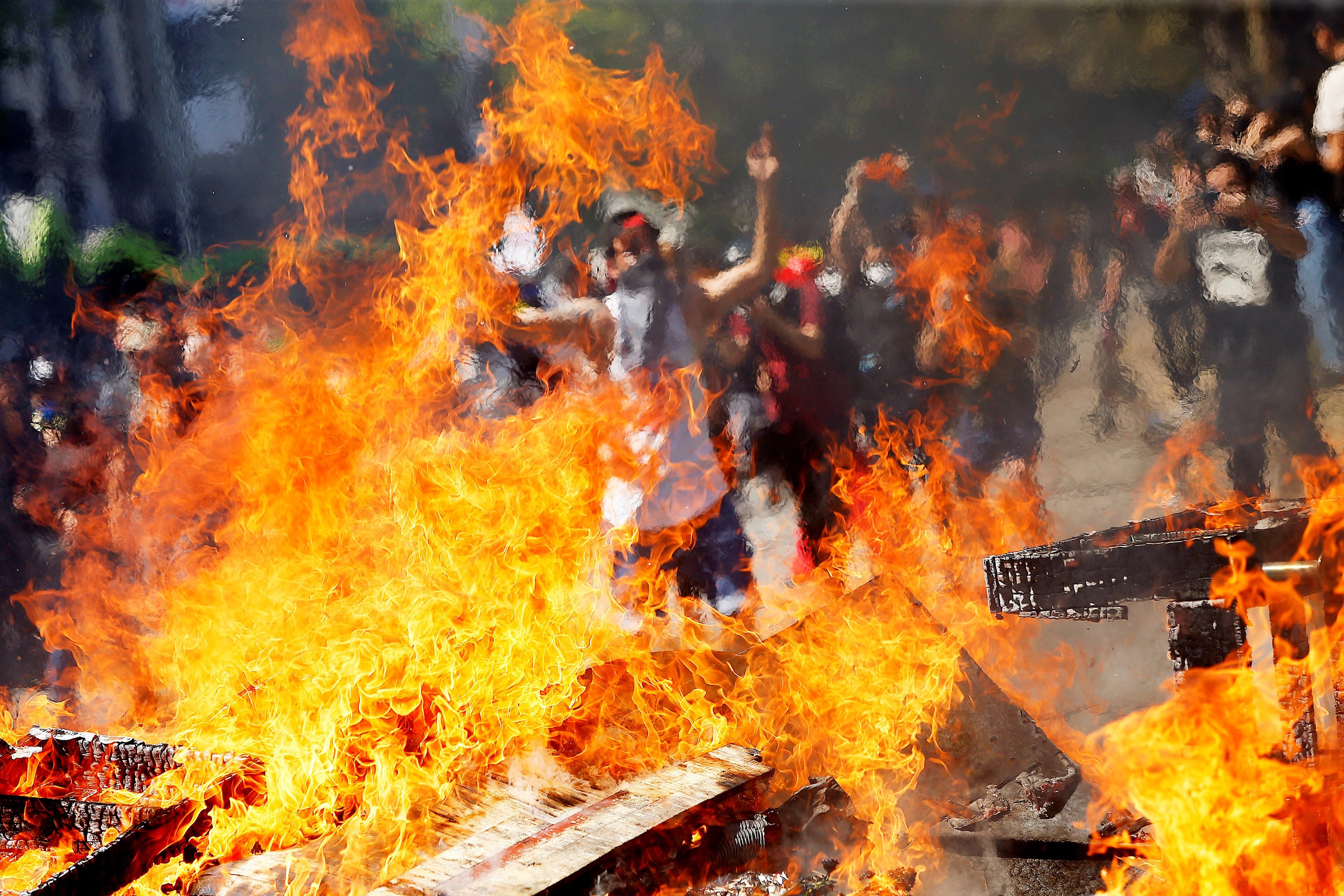 18 muertos y más de dos mil detenidos en las protestas de Chile 18 muertos y más de dos mil detenidos en las protestas de Chile