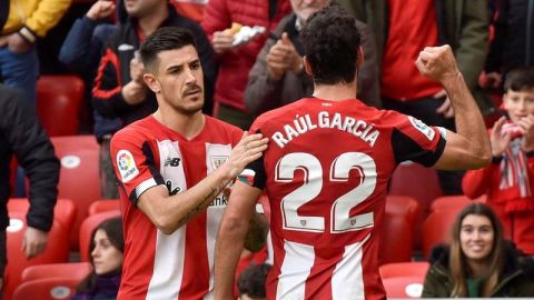 Ra&uacute;l Garc&iacute;a y Turi celebran sus goles ante el Granada
