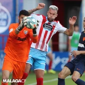 Un momento del Lugo-Málaga disputado ayer. Un momento del Lugo-Málaga disputado ayer.