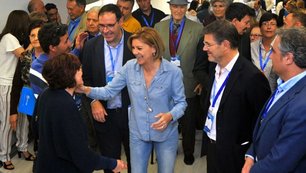 Prieto, con Cospedal y Catalá durante la clausura del congreso en 2017