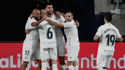 Jugadores del Huesca celebran un gol 