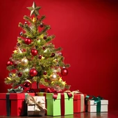 Un árbol de Navidad con regalos en Nochebuena Un árbol de Navidad con regalos en Nochebuena