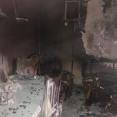 Estado en el que quedó la vivienda incendiada en Membrilla